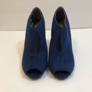 Blue peep toe high heels.